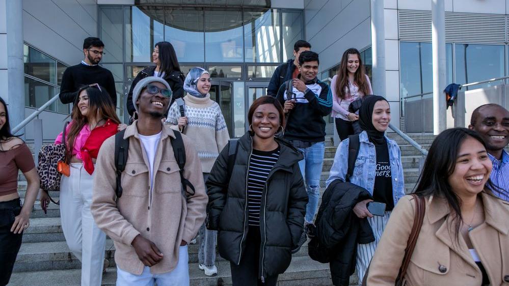 Students walking out of building